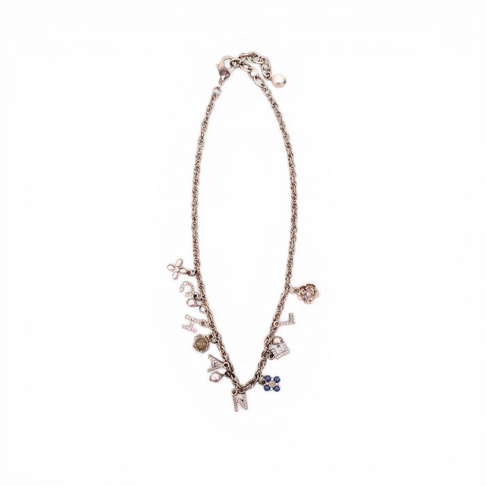 CHANEL GOLD LETTER CRYSTAL FLOWER CHAIN NECKLACE