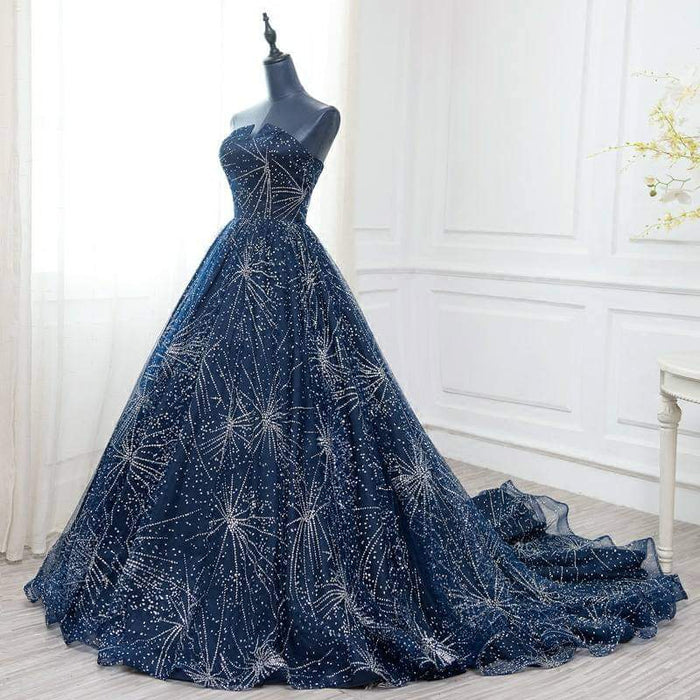 Navy Starburst Glitter Ball Gown – ชุดราตรียาวสีน้ำเงินกลิตเตอร์ลายพลุ