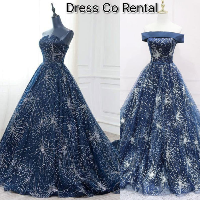 Navy Starburst Glitter Ball Gown – ชุดราตรียาวสีน้ำเงินกลิตเตอร์ลายพลุ
